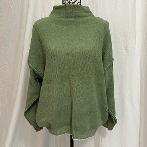 Gently worn green sweater.  Pink Lily.  Size Small.
